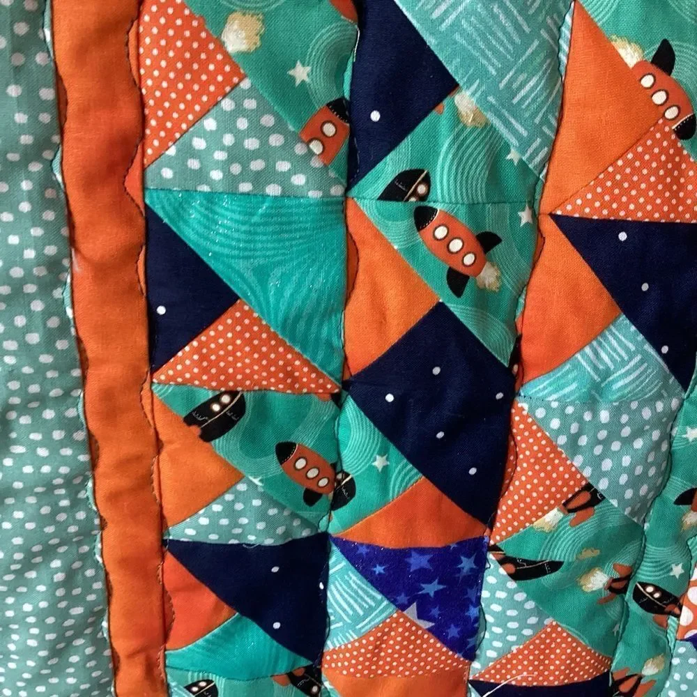 NWT. Hand Crafted To The Moon RocketshipColorful Patchwork Quilt w/ Teddy Quilt